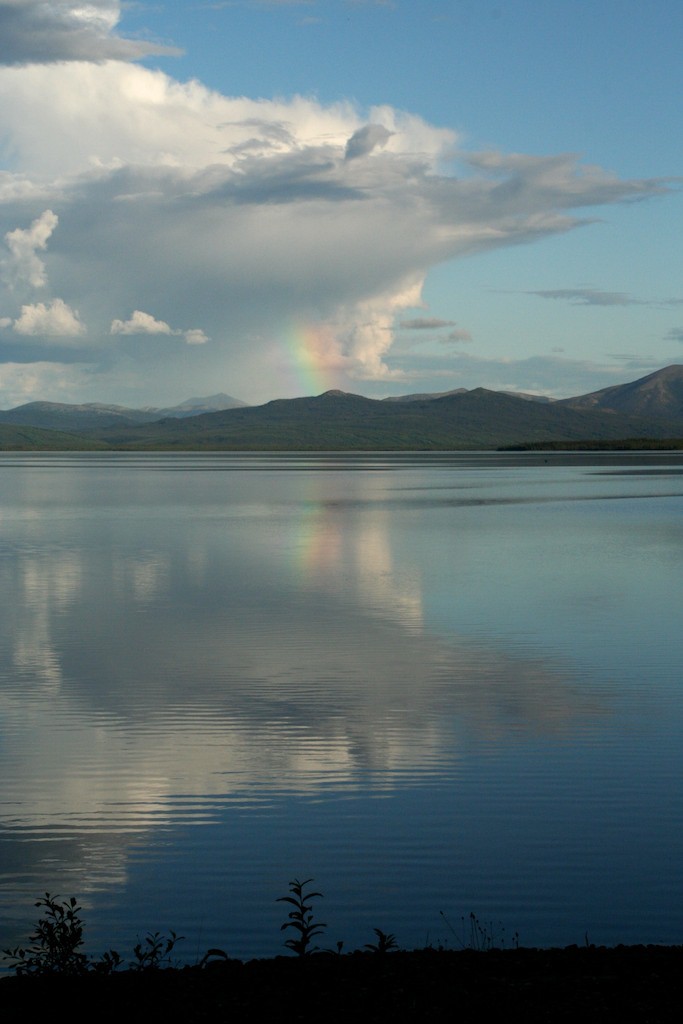 Rainbows can be a small sliver under a storm cloud