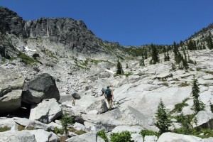 The sky appears more blue in the mountains because there are fewer aerosols to scatter white light