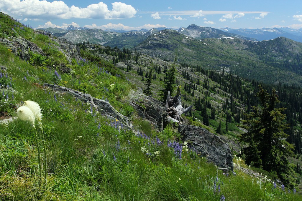 Snow still clings to the mountains after the summer solstice but the heat of summer quickly melts it