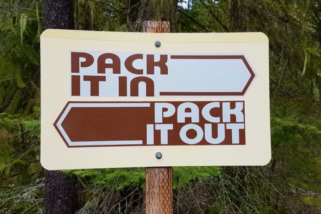 Pack it in, pack it out sign